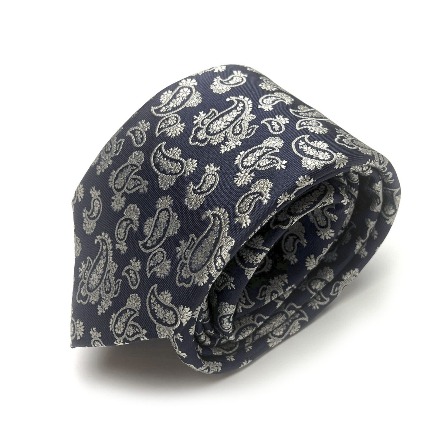 Tamsiai mėlynas vyriškas kaklaraištis puoštas kreminiu "paisley" raštu